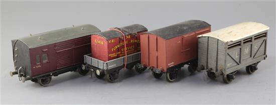 A cattle wagon, no.46219, in grey, a flat truck, no.M260113, in grey with LMS container, a horse box,